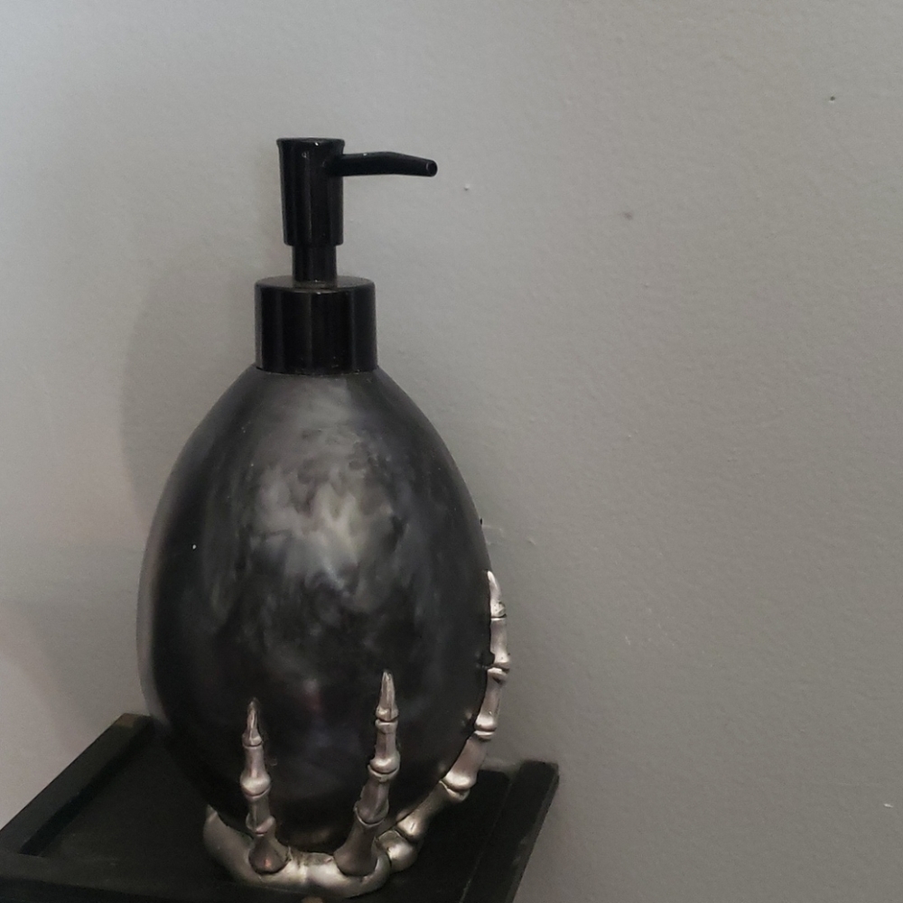 Spooky soap dispenser